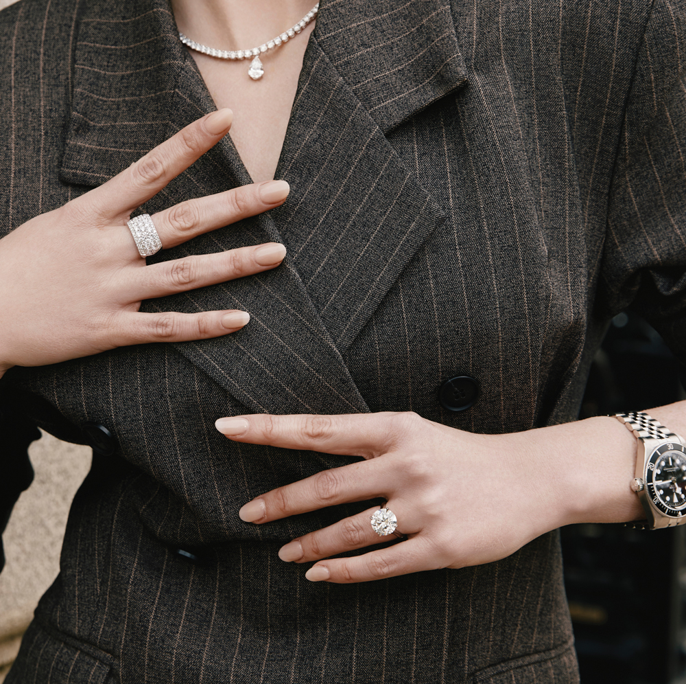 woman wearing diamond engagement ring