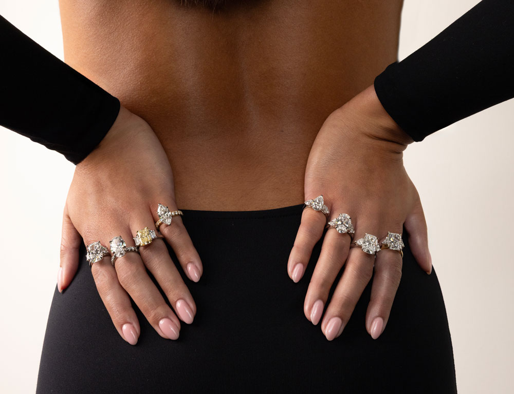 woman wearing diamond engagement ring