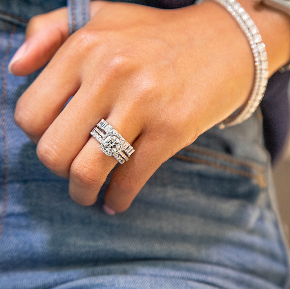 woman wearing diamond engagement ring