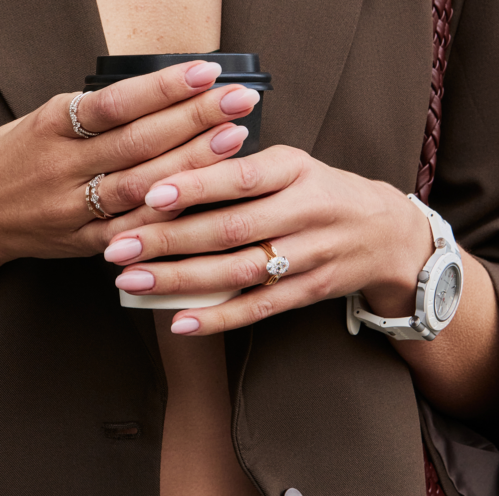 woman wearing diamond engagement ring